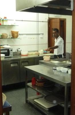 Jahinger preparing a Tandoori skewer