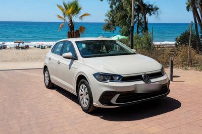 A compact car on a Marbella beach front