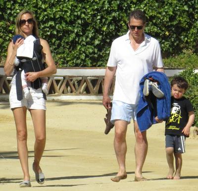 Hugh Grant and family stroll the boardwalk