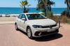 A compact car on a Marbella beach front