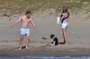 Hugh Grant and family on the beach