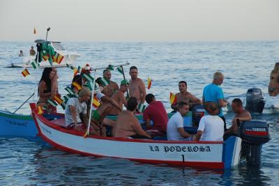 Fisherman boat accompanying the Virgin del Carmen